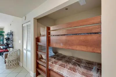 a bedroom with a bunk bed in a room at Aqua 1105 in Panama City Beach