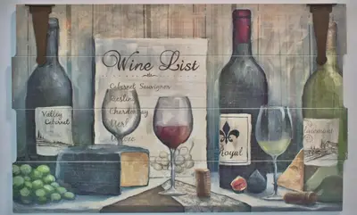 a painting of wine bottles and wine glasses at Aqua 1502 in Panama City Beach