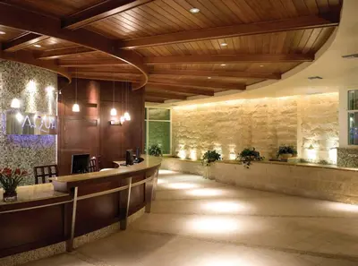 a lobby of a hotel with a bar at Aqua 0502 in Panama City Beach