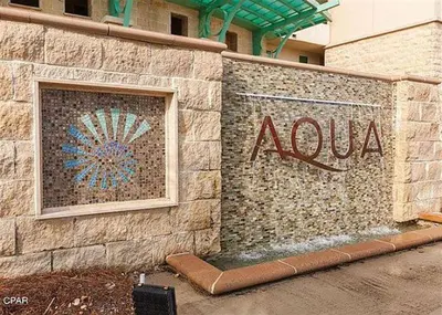 aania sign on the side of a building at Aqua 2206 in Panama City Beach