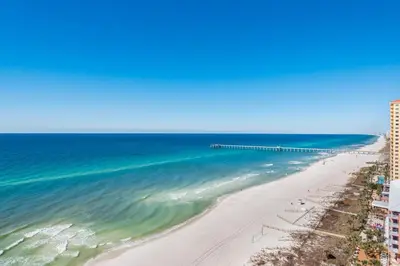 a view of a beach with a pier at Aqua 1510 in Panama City Beach