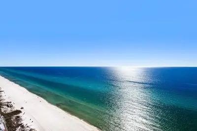 an aerial view of a beach and the ocean at Aqua 2304 in Panama City Beach