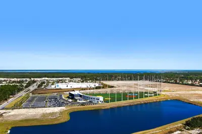 an aerial view of a wastewater treatment plant with a body of water at Aqua 2304 in Panama City Beach