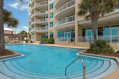 a large swimming pool in front of a building at Aqua 2304 in Panama City Beach