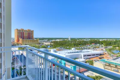 a view of a city from a balcony at Aqua 1001 in Panama City Beach