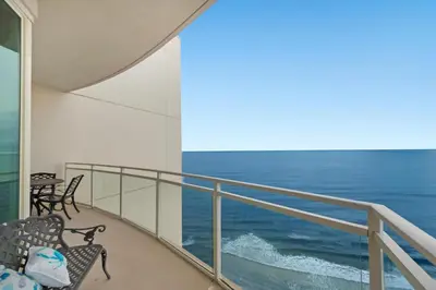 a balcony with a view of the ocean at Aqua 2211 in Panama City Beach