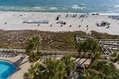 an aerial view of a beach with people and the ocean at Aqua 0503 in Panama City Beach