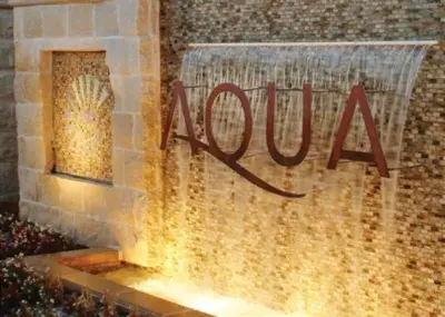 a sign for a nokia store on a wall at Aqua 1409 in Panama City Beach
