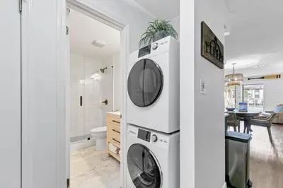 a laundry room with a washer and dryer at Dune Villas 6A in Santa Rosa Beach