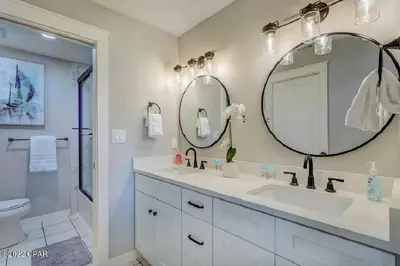 a bathroom with a sink and a mirror at Edgewater Beach Resort Dream Villa! One Bedroom in Panama City Beach