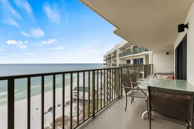 a balcony with a view of the ocean at Commodore 1205 with 2 beachfront masters in Panama City Beach