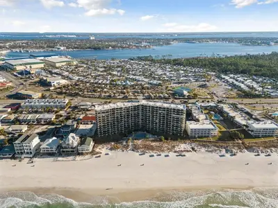 an aerial view of a resort on the beach at Commodore 1205 with 2 beachfront masters in Panama City Beach