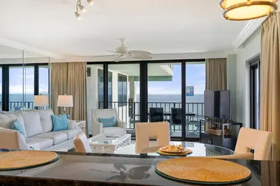 a living room with a couch and a table at Watercrest 1710 - Sunsets in Paradise - Sleeps 8 in Panama City Beach