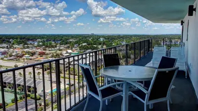 a balcony with a table and chairs and a view at Watercrest 1710 - Sunsets in Paradise - Sleeps 8 in Panama City Beach