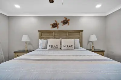 a bedroom with a bed with two pillows on it at Edgewater Beach Resort stay at Cozy Beach Getaway! in Panama City Beach