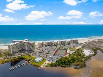 an aerial view of a resort on the beach at Serenity Found at A-521 in Panama City Beach