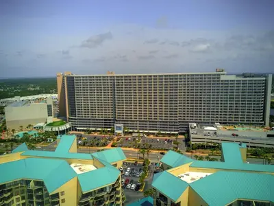 a large hotel building with a lot of parking at Penthouse at Laketown Wharf in PCB! 2132 in Panama City Beach