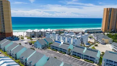 an aerial view of a resort near the beach at Paradise found steps to beach in Panama City Beach