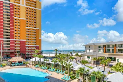 an aerial view of a resort with a pool and buildings at Calypso 3-309 - Gypsea's View in Panama City Beach