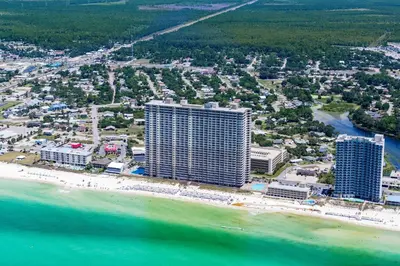 an aerial view of a resort on a beach at Tidewater 715 in Panama City Beach