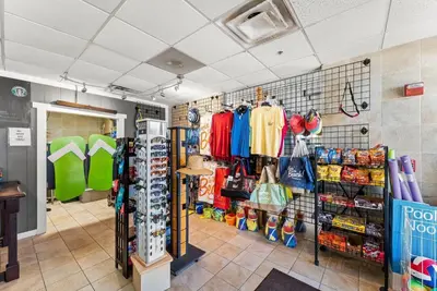 a store room with a lot of clothes and shoes at Tidewater 2903 in Panama City Beach