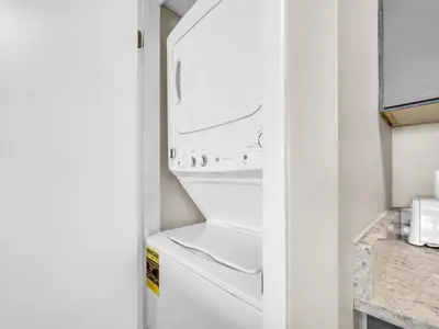 a white washer and dryer in a kitchen at Edgewater Tower 3-1110 - South of Heaven in Panama City Beach