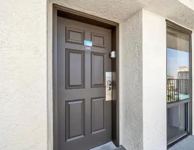 a door of a building with a window at Edgewater Tower 3-1110 - South of Heaven in Panama City Beach