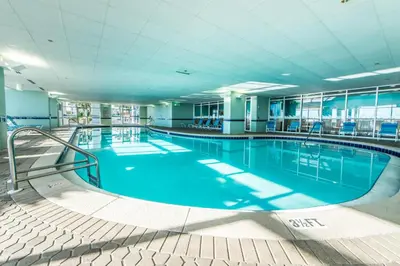 a large swimming pool in a large building at Majestic Beach Towers 2-1801 in Panama City Beach