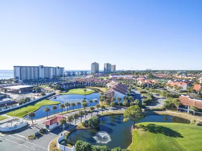 an aerial view of a resort with a golf course at Edgewater Golf Villa 3204 in Panama City Beach