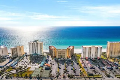 an aerial view of a beach with buildings and the ocean at East-End PCB Condo with Gulf Views & Beach Access in Panama City Beach