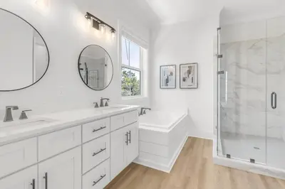 a white bathroom with a sink and a shower at Brand New, Private Pool, Walk To Beach, Game Room in Inlet Beach