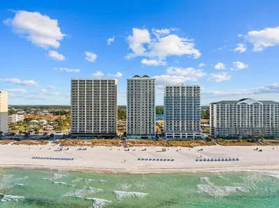 an aerial view of a beach with tall buildings at Beachfront Bliss at Ocean Ritz! 3BR 3BA! Sleeps 10 by Dolce Vita Getaways PCB in Panama City Beach