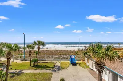 a view of the beach from the balcony of a beach house at The Summit 301 in Panama City Beach