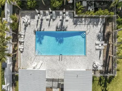 an overhead view of a swimming pool in a resort at Available for Spring Break! Seas The Day at Inlet Beach in Inlet Beach