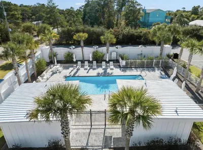 an overhead view of a pool with palm trees at Available for Spring Break! Seas The Day at Inlet Beach in Inlet Beach