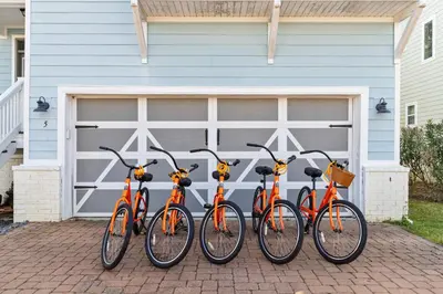 a group of bikes parked in front of a garage at Blue Sky Bungalow in Inlet Beach