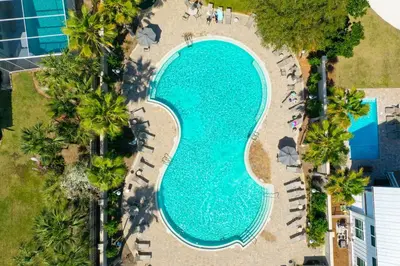an overhead view of a swimming pool at a resort at Blue Sky Bungalow in Inlet Beach