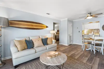 a living room with a couch and a table at Endless Summer A36 - 