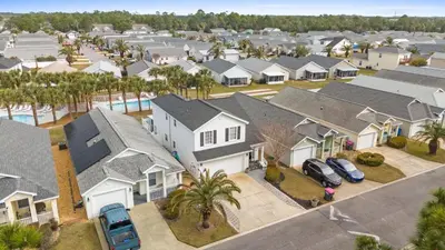 an aerial view of a residential neighborhood with houses at Beach House - Paradise Palace by Panhandle Getaways in Panama City Beach