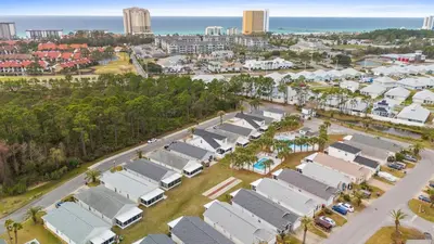 an overhead view of a row of houses in a city at Beach House - Paradise Palace by Panhandle Getaways in Panama City Beach