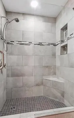a bathroom with a shower with a glass door at Ocean Bliss by Emerald Coast Retreats in Panama City Beach