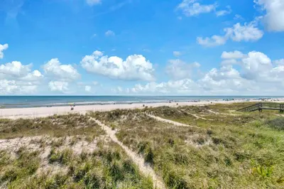 a view of a beach with people on it at Ocean Bliss by Emerald Coast Retreats in Panama City Beach
