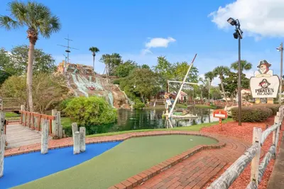 a miniature golf course at a theme park at Treasure Shores–3BR Beachfront Corner Unit sleeps 8 with Stunning Gulf Views! in Panama City Beach