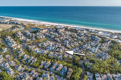 an aerial view of a residential area next to the beach at Our Tree House by Oversee 30A in Inlet Beach