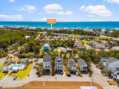an aerial view of a resort with the ocean in the background at 30A Pet Friendly Beach House - Paradise Valle by Panhandle Getaways in Inlet Beach