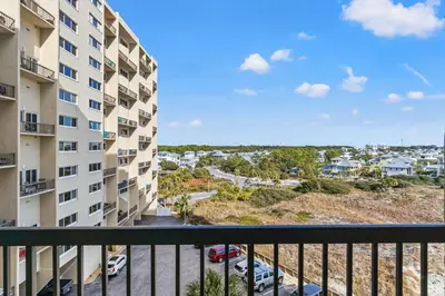 a balcony with a view of a parking lot at Pinnacle Port A-514 in Carillon Beach