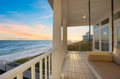 a house with a balcony overlooking the beach at Rays on 30A in Santa Rosa Beach