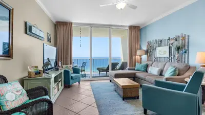 a living room with a couch and chairs at Palazzo 806 in Panama City Beach
