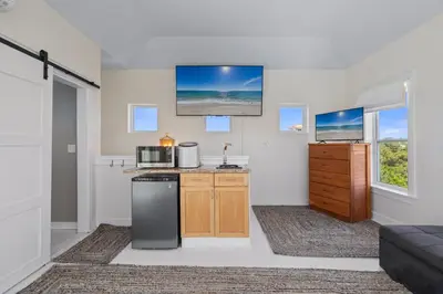 a kitchen with a sink and a microwave at Ocean Glory 30A in Inlet Beach