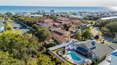 an aerial view of a residential neighborhood with the ocean at PCB Group-Friendly Duplex w Pool Backyard Lounge 2 Kitchens in Panama City Beach